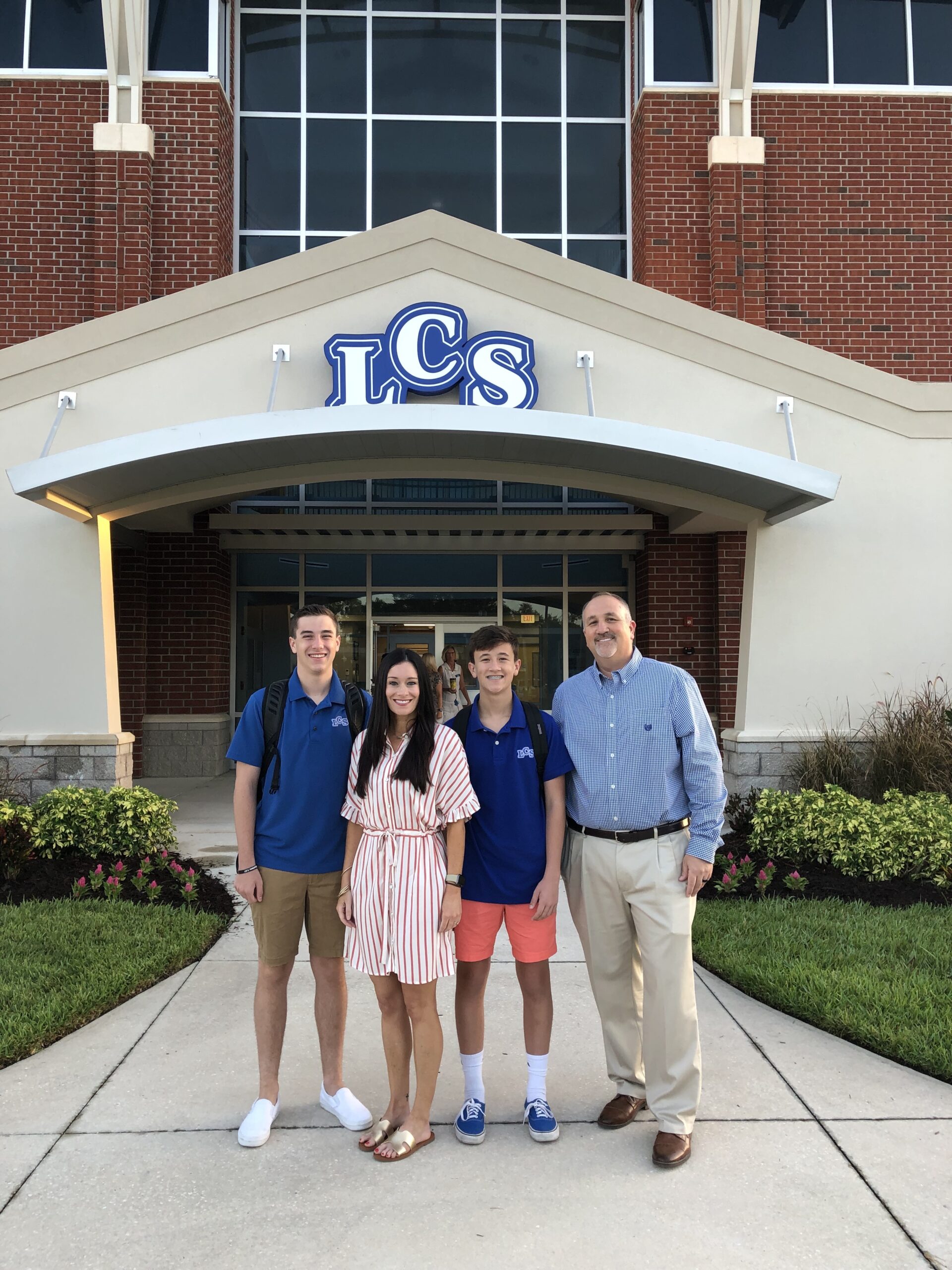Copeland family in front of LCS on first day of school