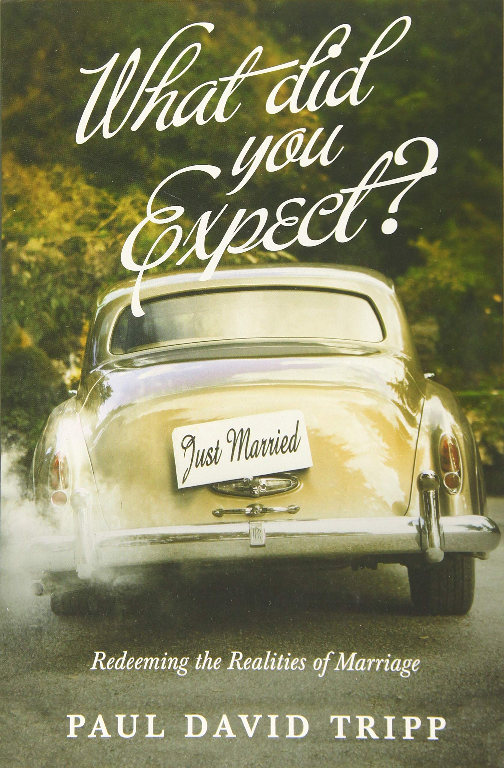 picture of a book cover with a vintage yellow car and a "just Married" sign on it. The title of the book written big "What did you expect?" with the sub-title "Redeeming the Realities of Marriage" and the authors name "Paul David Tripp"